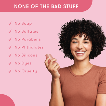 Model holding HiBAR conditioner bar in her hand with a list of bad things that are not in HiBAR. No soap. No sulfates. No parabens. No phthalates. No silicons. No dyes. No cruelty.