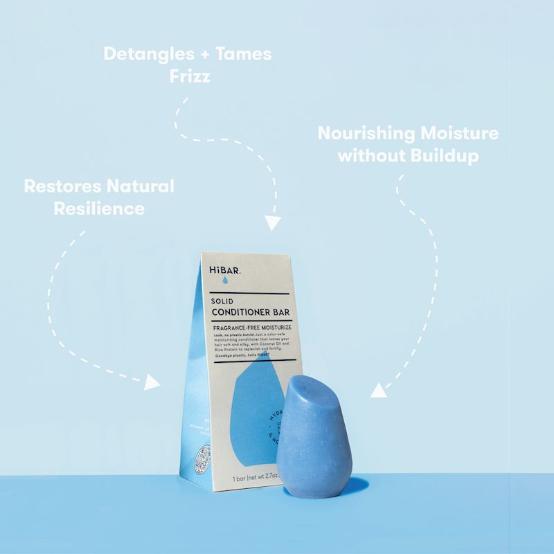 HIBAR solid conditioner bar on a light blue background with text about product benefits. Detangles + tames frizz. Restores Natural Resilience. Nourishing Moisture without buildup.