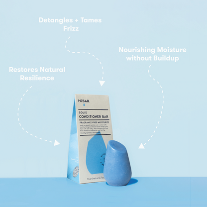 HIBAR solid conditioner bar on a light blue background with text about product benefits. Detangles + tames frizz. Restores Natural Resilience. Nourishing Moisture without buildup.