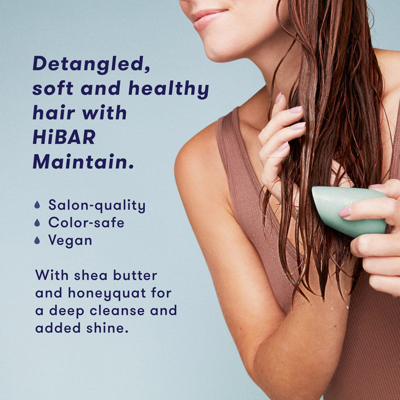 Woman washing hair with conditioner bar. HiBAR Maintain conditioner bar gives you detangled, soft and healthy hair, is salon-quality, color-safe, vegan, and contains shea butter and honeyquat for a deep cleanse and added shine.