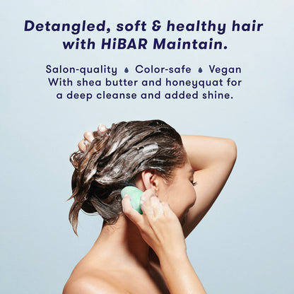 Woman washing hair with shampoo bar. HiBAR Maintain shampoo bar and conditioner bar gives you detangled, soft and healthy hair, is salon-quality, color-safe, vegan, and contains shea butter and honeyquat for a deep cleanse and added shine.