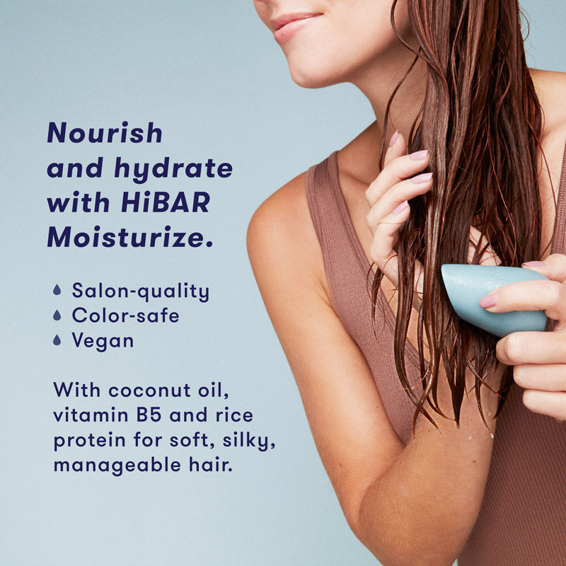Woman washing hair with conditioner bar. HiBAR Moisturize conditioner bar nourishes and hydrates, is salon-quality, color-safe, vegan, and contains coconut oil, vitamin B5 and rice protein for soft, silky, manageable hair.