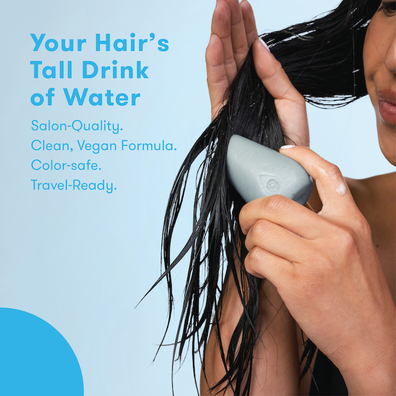 Person using conditioner bar with text about salon-quality, clean, vegan formula, color-safe, and travel-ready product on a blue background.
