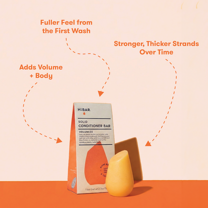 HIBAR solid conditioner bars with packaging on a peach background with product highlights: Fuller feel from the first wash. More Volume + Body. Stronger, thicker strands over time. 